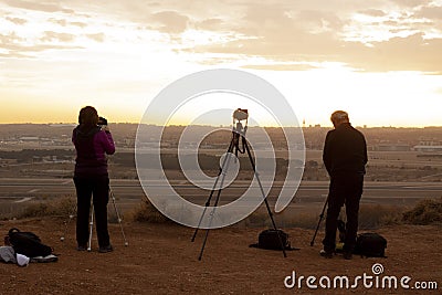 Photographers photographing a sunset Editorial Stock Photo