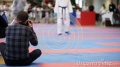 Photographers shoot during a karate competitions Editorial Stock Photo