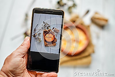 Photographing a bean casserole with the smartphone Stock Photo