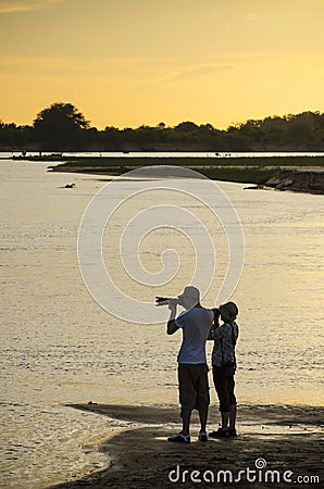 Photographing Rufiji river in sunset Stock Photo