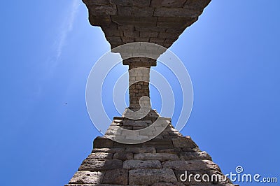 Photographs From The Base Of One Of The Arches Of The Aqueduct To Be Able To Intuit Its Greatness In Segovia. Architecture, Travel Stock Photo