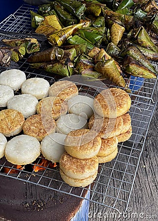 a photography of a grill with some food on it, bakehouse food on a grill with a variety of vegetables Stock Photo