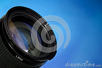 Photography lens over blue Stock Photo