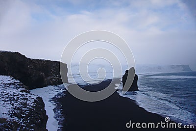 Waves on the shore of black sand beach, Iceland Stock Photo