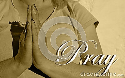 Photography of woman making praying gesture with her hands with word Pray Stock Photo