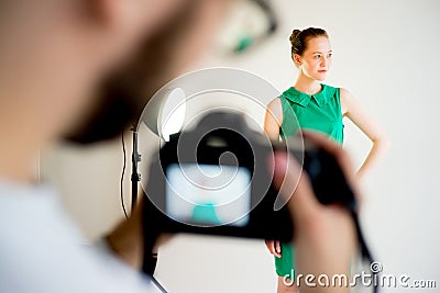 Photogtapher working in studio Stock Photo