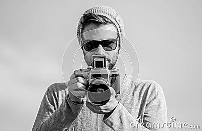Photojournalist concept. Hipster reporter taking photo. Manual settings. Travel blogger. Professional photographer Stock Photo