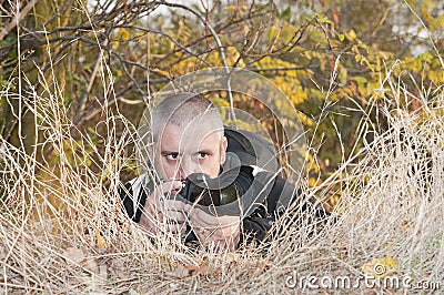 Photojournalist in a jungle. Stock Photo