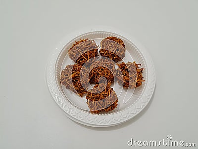 A market snack made from grated sweet potato that is fried has a sweet taste, the name is carang mas Stock Photo