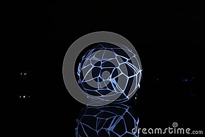 Moscow Lightfest. Nightly aqua ball on a lake in Ostankino Park. Editorial Stock Photo