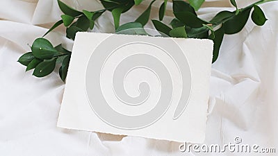 Photostock wedding styled composition. Feminine desktop mockup scene with eucalyptus leaves, silk ribbon, blank brown greeting car Stock Photo