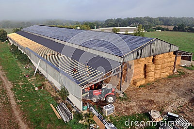 Photovoltaic panels on a farm shed Editorial Stock Photo