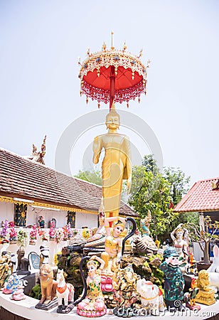 Phra That Doi Kham Temple: A Spiritual Haven in Chiang Mai, Thailand, Bathed in Golden Serenity Stock Photo