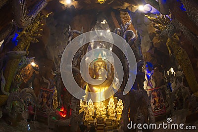 Phra Rattana Mahabadan and the guardian serpent in the Naga cave at Wat Maniwong Temple. Stock Photo