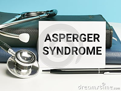 Phrase ASPERGER SYNDROME written on white card Stock Photo