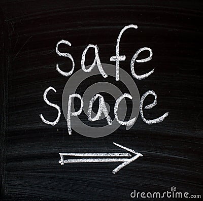 The phrase Safe Space on a blackboard Stock Photo