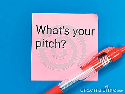 Phrase what is your pitch written on sticky note with a pen. Stock Photo