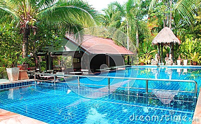 PHUKET, THAILAND - 26.04.2013: beautiful swimming pool with blue water in hotel Kata Country House, tropical resort Editorial Stock Photo