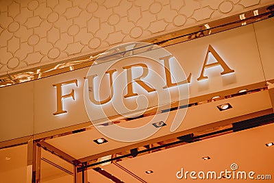 PHUKET, THAILAND - MAY 29, 2022: Furla brand retail shop logo signboard on the storefront in the shopping mall Editorial Stock Photo