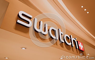 PHUKET, THAILAND - MAY 29, 2022: Swatch brand retail shop logo signboard on the storefront in the shopping mall Editorial Stock Photo