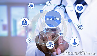 Physician choosing healing button among medical icons Stock Photo