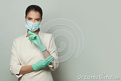 Physician or nurse with syringe injection on white background. Medicine, cosmetology and vaccination concept Stock Photo