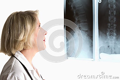 Physician with spine x-rays Stock Photo