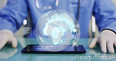 A physician, surgeon, examines a technological digital holographic plate represented the patient`s body, the heart lungs, muscles, Stock Photo