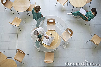 Physicians During Work Break In Cafeteria Stock Photo
