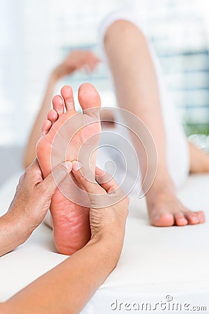 Physiotherapist massaging her patients foot Stock Photo