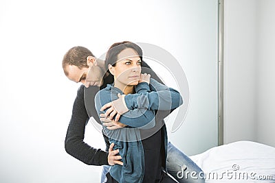 Physiotherapist massaging a woman lumbar. Physiotherapy and osteopathy Stock Photo