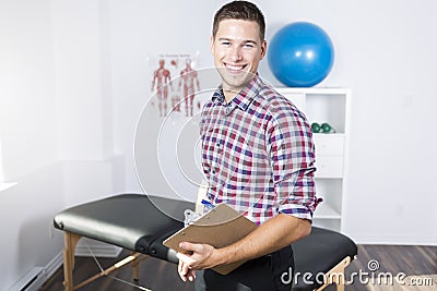 Physiotherapist rehabilitating at job Stock Photo