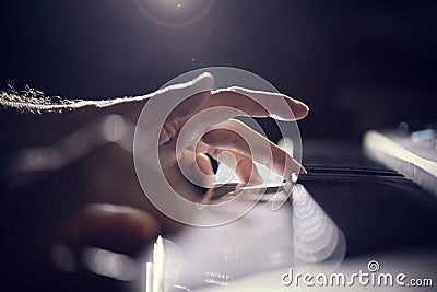 Pianist musician playing piano keyboard performing at live gig Stock Photo