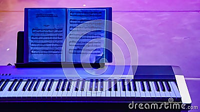 Piano in blue violet color Stock Photo