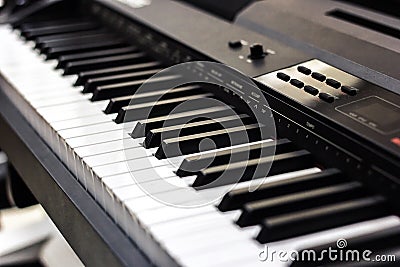 Piano close up black and white Piano keyboard background with selective focus, studio music synthesizer keyboard side view of inst Stock Photo