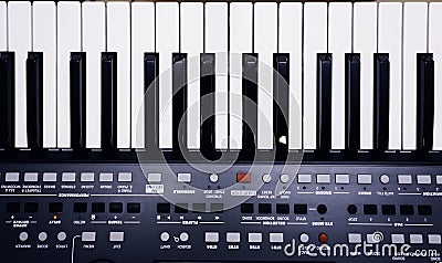 Piano or electronic synthesizer piano keyboard background Midi keyboard and controller with faders and buttons. Concept of close Stock Photo