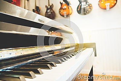 Piano keyboard with guitar back ground Stock Photo