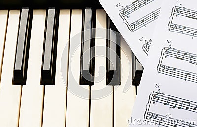 Piano keyboard and sheetmusic Stock Photo