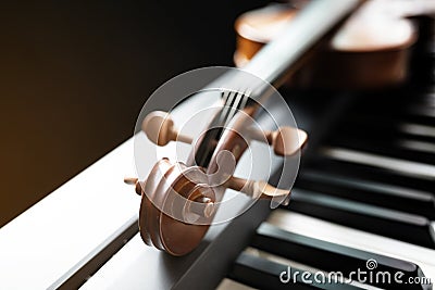 Piano keyboard with violin Stock Photo