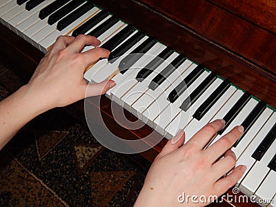 Piano keys hand music Stock Photo