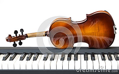 Piano keys and violin Stock Photo