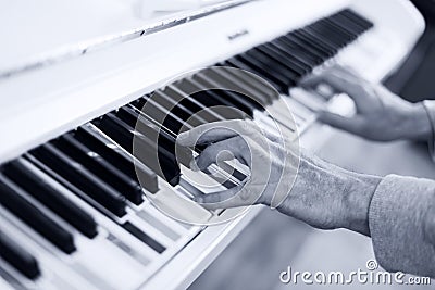 Piano with multy coloure keys. Close up Stock Photo