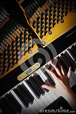 Grand piano hands playing Stock Photo