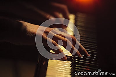 Piano player hands on the keyboard Stock Photo