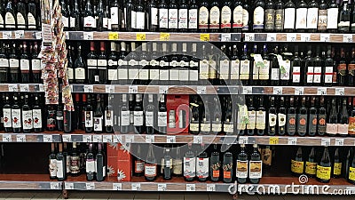 Wine bottles shelf Editorial Stock Photo
