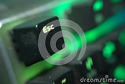 Pic seven, black keyboard colorful lights pattern with focus knob esc` Stock Photo