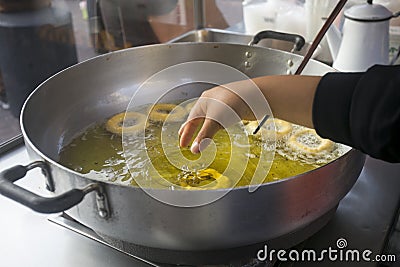 Picarones are ring-shaped fried sweets Stock Photo