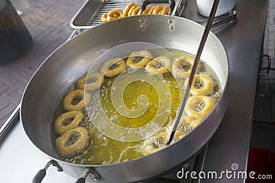 Picarones are ring-shaped fried sweets Stock Photo