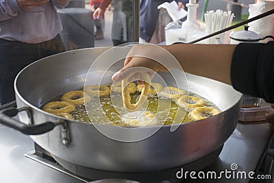 Picarones are ring-shaped fried sweets Stock Photo