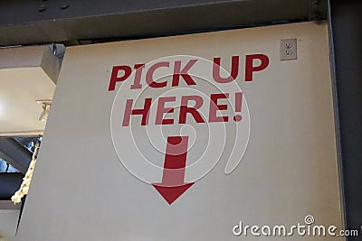 Pick up here sign at a restaurant Stock Photo